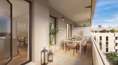 Amplia terraza privada en una vivienda de obra nueva en Entrenúcleos. Espacio exterior diseñado para el confort con mobiliario de comedor, plantas decorativas y vistas despejadas, integrándose perfectamente con el interior a través de grandes ventanales.